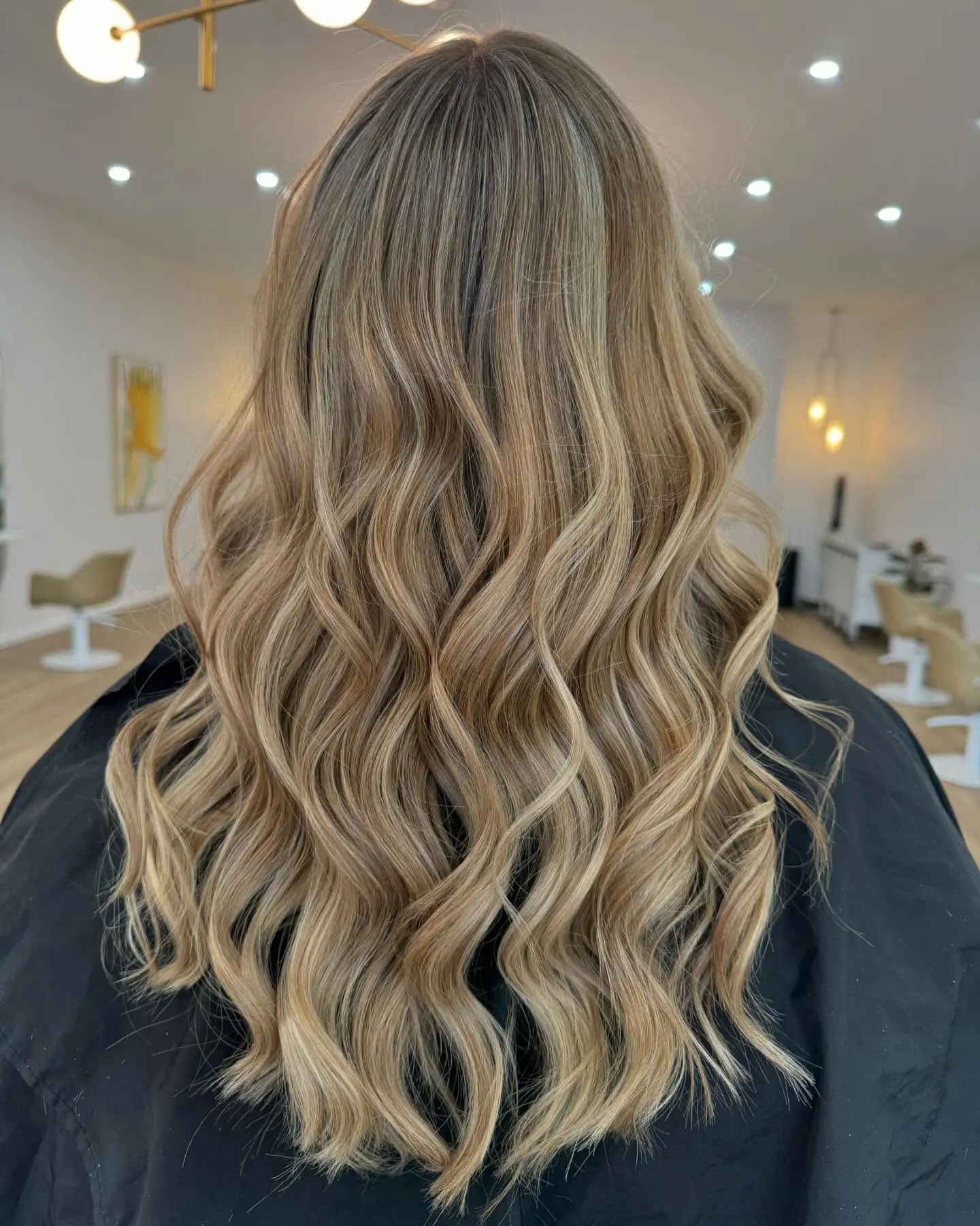 Blonde balayage with sun-kissed waves and natural highlights at Ergo and Mane salon in Bridgewater near Bendigo