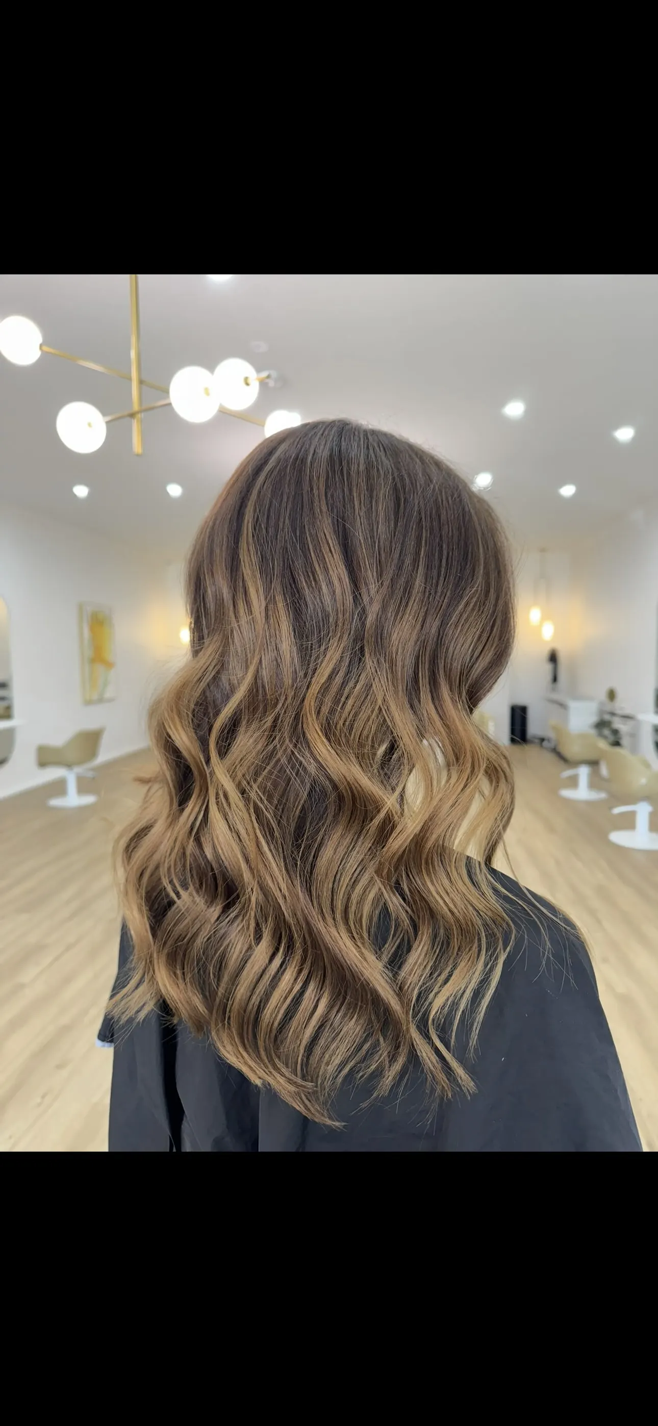 Long brunette balayage with caramel waves by Ergo and Mane Bridgewater