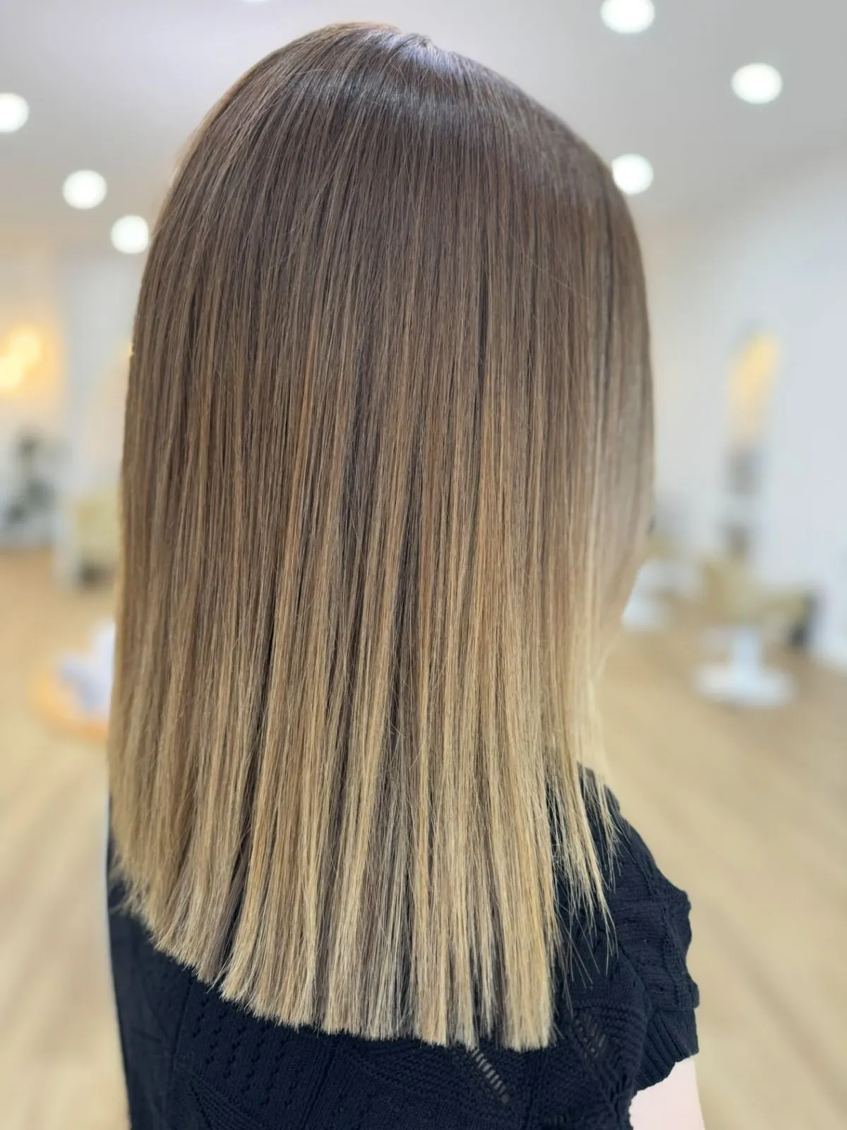 Brunette to blonde ombre balayage with sleek finish at Ergo and Mane Bridgewater near Bendigo