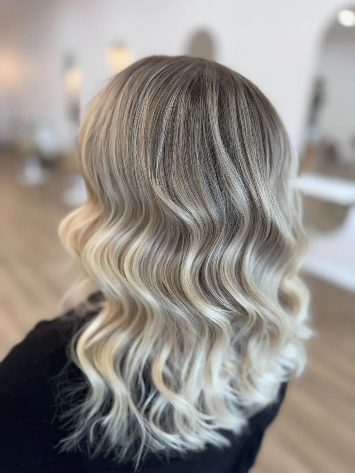 Lived-in blonde balayage with glossy waves at Ergo and Mane Bridgewater near Bendigo