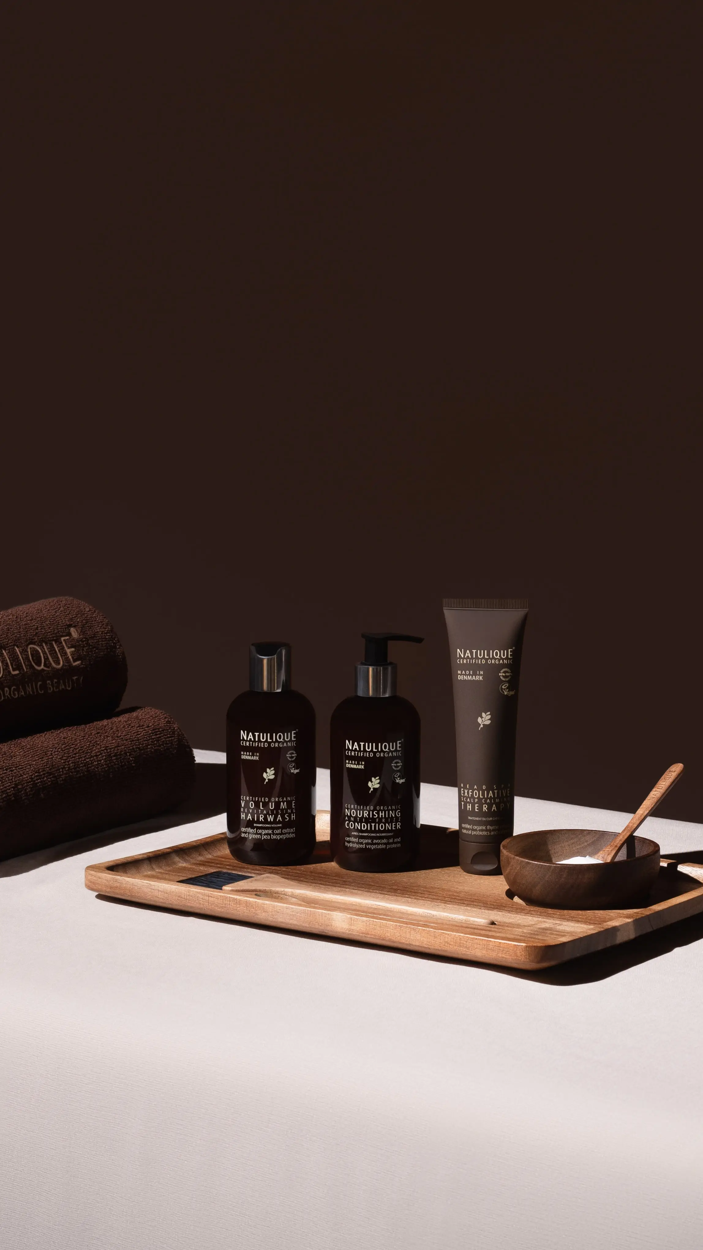 NATULIQUE certified organic head spa products including volume hair wash nourishing conditioner and exfoliative therapy at Ergo and Mane Bridgewater