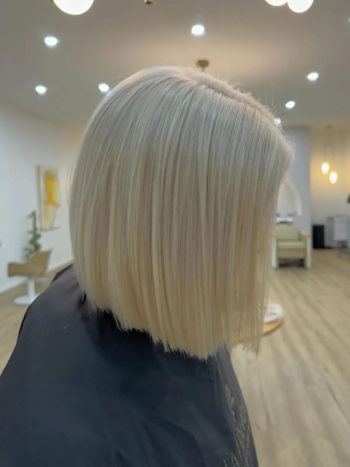 Platinum blonde bob haircut with sharp precision finish at Ergo and Mane Bridgewater near Bendigo