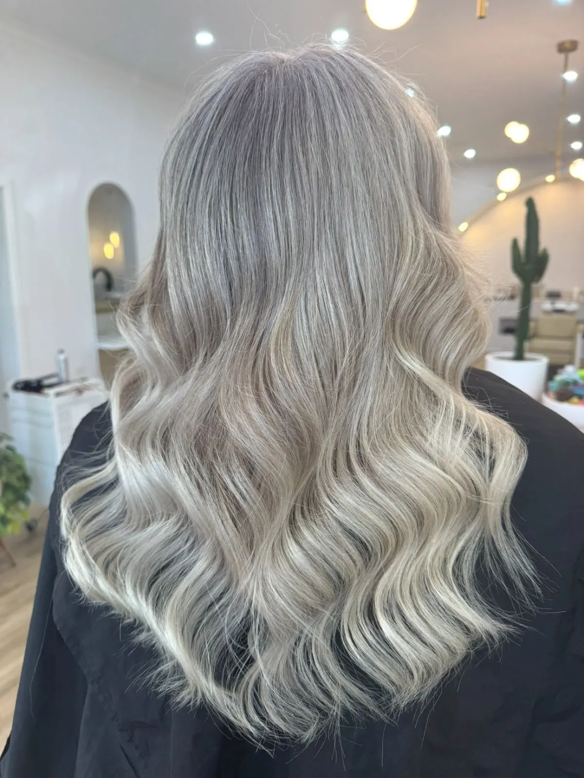 Silver ash blonde balayage with soft waves at Ergo and Mane Bridgewater near Bendigo