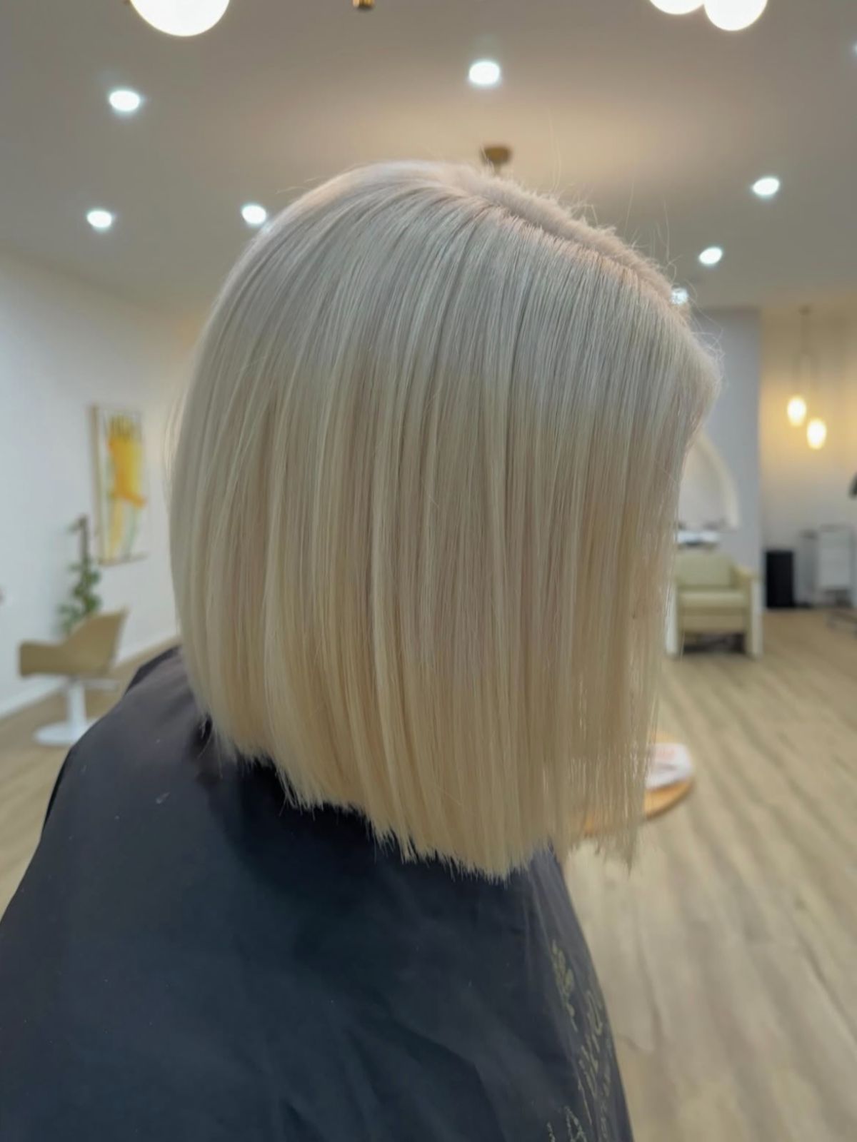 Platinum blonde bob haircut with sharp precision finish at Ergo and Mane Bridgewater near Bendigo